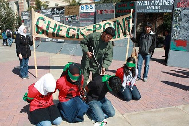 A mock checkpoint set up during “Israeli Apartheid Week,” an annual global anti-Israel initiative, at the University of California, Los Angeles. Credit: AMCHA Initiative.