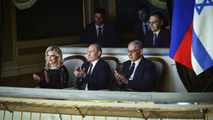 Israeli Prime Minister Benjamin Netanyahu (front right) and his wife, Sara, with Russian President Vladimir Putin (center) at the Bolshoi Theatre in Moscow June 7, 2016. Credit: Haim Zach/GPO.