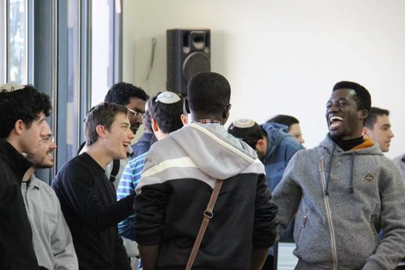 Catholic students in the four-year degree program of Jerusalem-based Salesian Pontifical University visit the yeshiva located on Kibbutz Ma'ale Gilboa. Credit: Courtesy Shalom Hartman Institute.