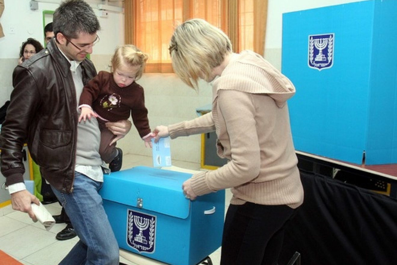 An Israeli family casts a ballot at a polling station in Tel Aviv on Feb. 10, 2009. Photo by Flash90.