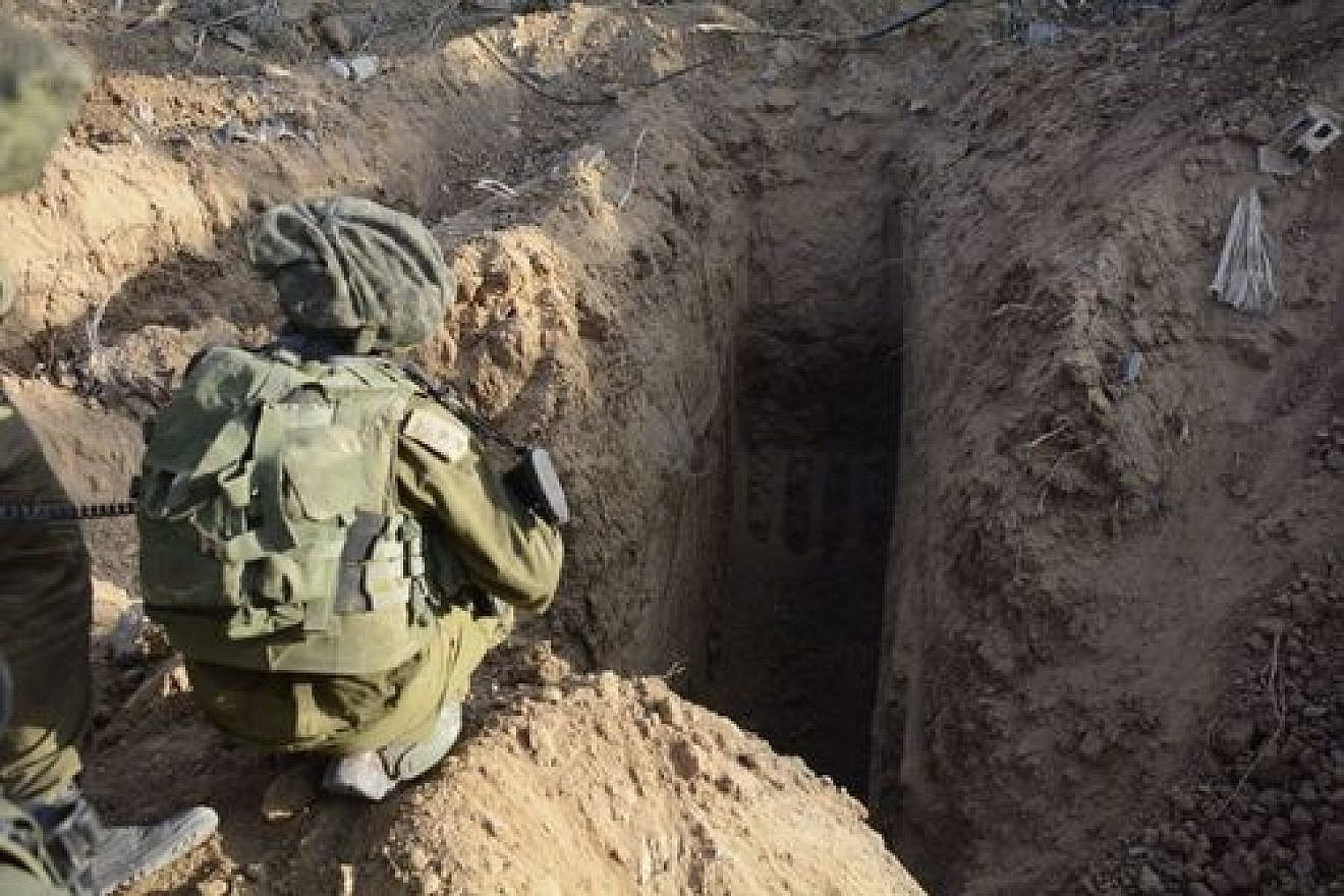 An Israeli soldier overlooks a Hamas tunnel in Gaza in July 2014, during “Operation Protective Edge.” Credit: Israel Defense Forces.