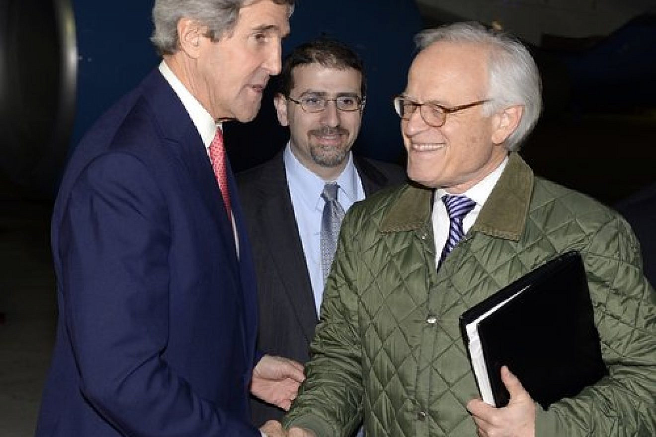 U.S. Special Envoy for Israeli-Palestinian Negotiations Martin Indyk shakes hands with U.S. Secretary of State John Kerry at Israel's Ben-Gurion International Airport, Jan. 5, 2014. Credit: Matty Stern/U.S. Embassy Tel Aviv/Flash90.