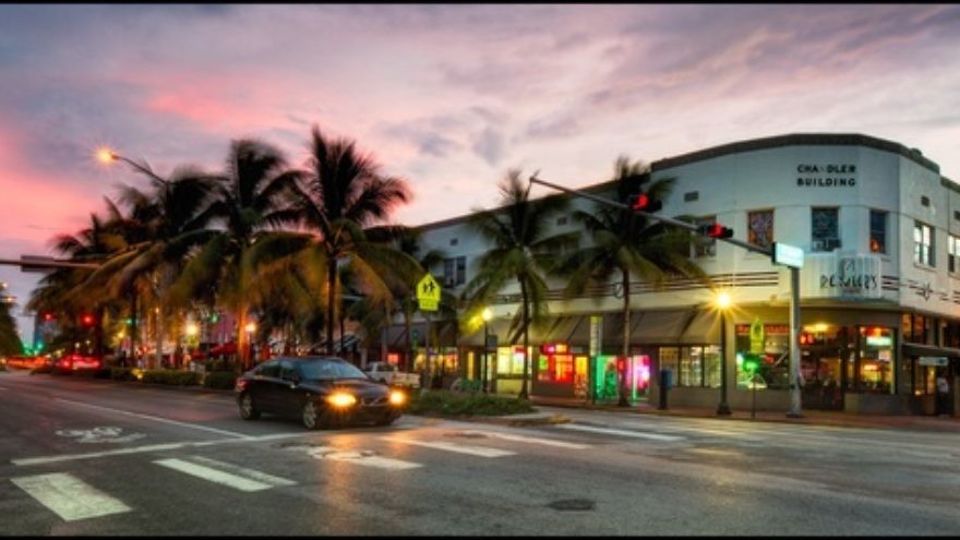 A view of Washington Avenue and 15th Street in South Beach, Miami. Rather than the partying/nightlife destination it is known as today, South Beach used to be a prime spot for Jewish seniors. Credit: Pedro Szekely via Wikimedia Commons.