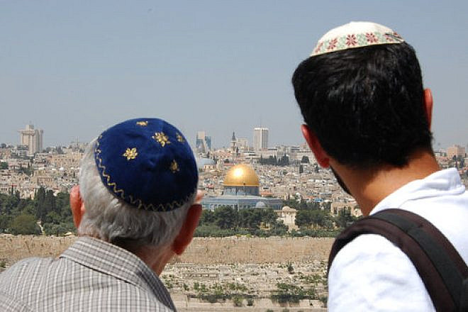 Two Jewish men look at Jerusalem’s Old City, including the Temple Mount, from the Mount of Olives. Credit: Rachael Cerrotti/Flash90.