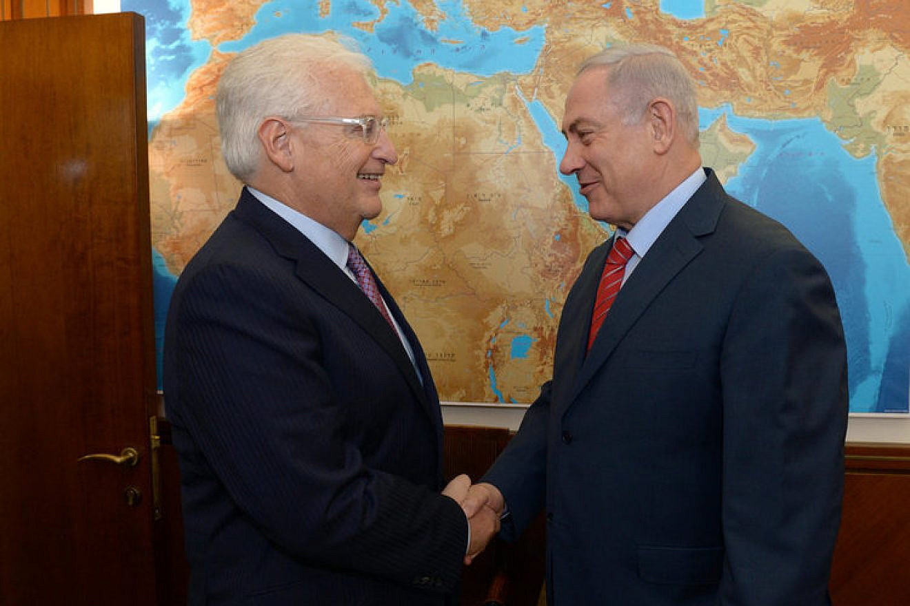 U.S. Ambassador to Israel David Friedman (left) greets Israeli Prime Minister Benjamin Netanyahu. Credit: GPO.