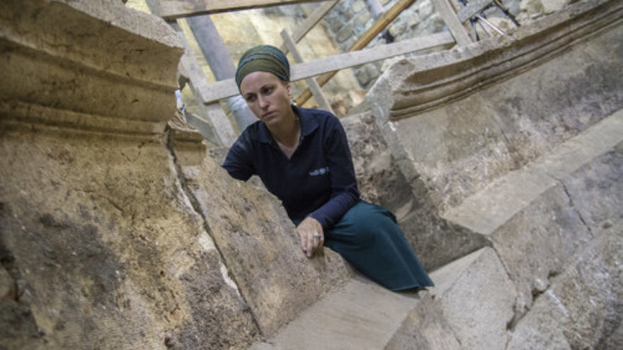 Israel Antiquities Authority archaeologist Tehillah Lieberman at the newly discovered ancient Roman theater in Jerusalem. Credit: Yaniv Berman/Israel Antiquities Authority.