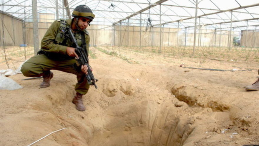 An Israeli soldier pictured in 2006 at a tunnel uncovered during an Israeli counterterrorism operation designated to thwart weapons-smuggling from Egypt to Gaza. Credit: Israel Defense Forces.