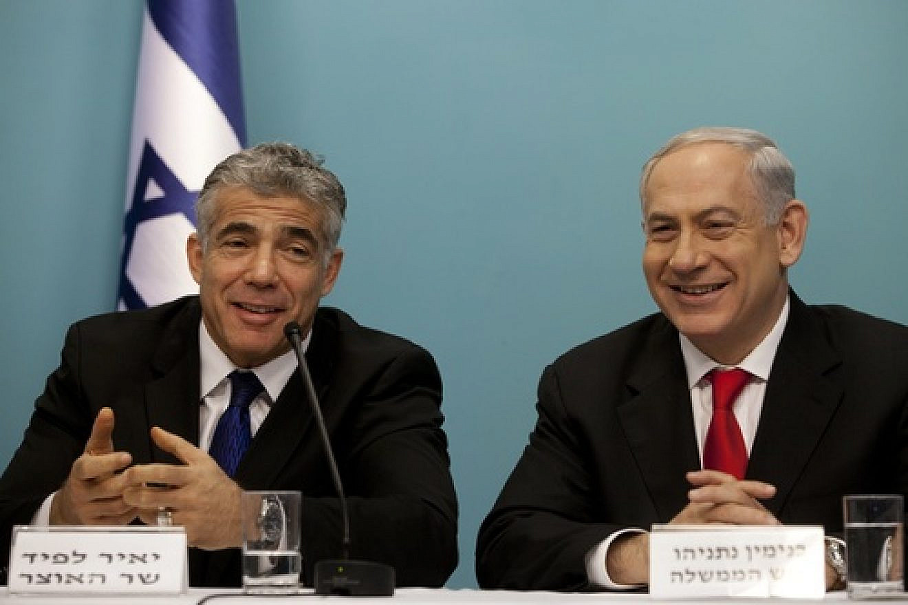 Israeli Prime Minister Benjamin Netanyahu and then-Finance Minister Yair Lapid during a press conference on July 3, 2013. Photo by Flash90.