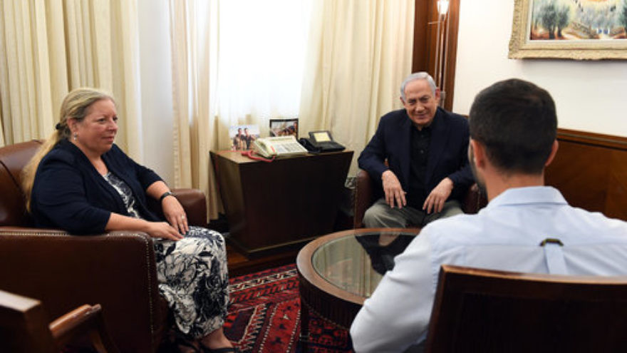 Prime Minister Benjamin Netanyahu meets July 25 with Israeli Ambassador to Jordan Einat Shlain (left) and Ziv (full name not released), the Israeli embassy security guard who was attacked before shooting his assailant and a bystander in Amman. Credit: Haim Zach/GPO.