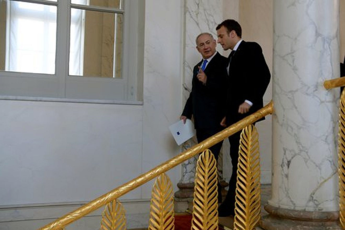 Israeli Prime Minister Benjamin Netanyahu and French President Emmanuel Macron meet at the Elysee Palace in Paris, Dec. 10, 2017. Credit: Avi Ohayon/GPO.