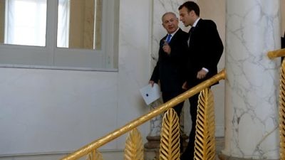 Israeli Prime Minister Benjamin Netanyahu and French President Emmanuel Macron meet on Dec. 10 at the Elysee Palace in Paris. Credit: Avi Ohayon/GPO.