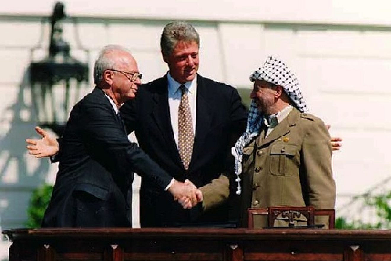 Israeli Prime Minister Yitzhak Rabin, U.S. President Bill Clinton and PLO head Yasser Arafat at the signing of the Oslo I Accord, Sept. 13, 1993. Photo by Vince Musi/The White House.