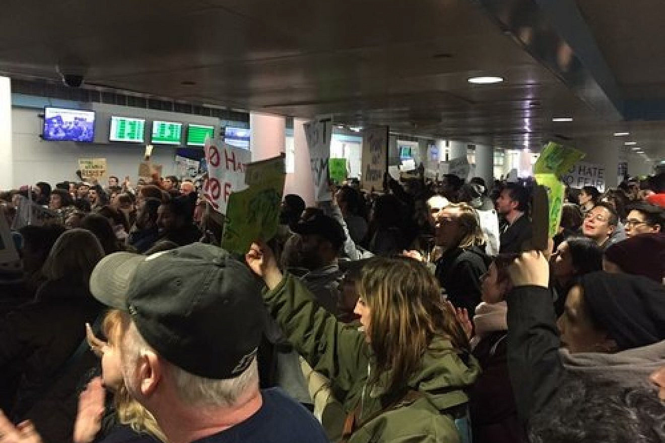 A protest against President Donald Trump's travel ban at Chicago's O'Hare International Airport Jan. 28. Credit: Amy Guth via Wikimedia Commons.
