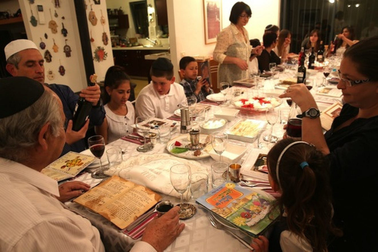A family seen during the Passover seder on the first night of the holiday in Tzur Hadassah, Israel, on March 25, 2013. Photo by Nati Shohat/Flash 90.