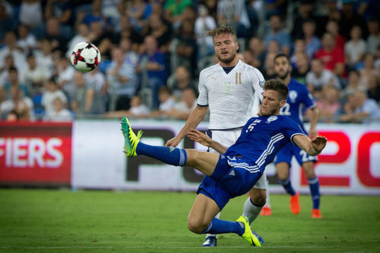 A FIFA World Cup qualifier match between Israel (blue uniform) and Italy at the Sami Ofer stadium in Haifa on Sept. 5, 2016. Credit: Yonatan Sindel/Flash90.