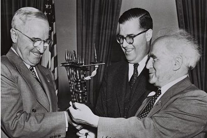U.S. President Harry S. Truman, Israeli Ambassador to the United States Abba Eban and Israeli Prime Minister David Ben-Gurion in the White House on May 1, 1951. The Israeli leaders presented Truman with a menorah. Credit: Fritz Cohen via Wikimedia Commons.