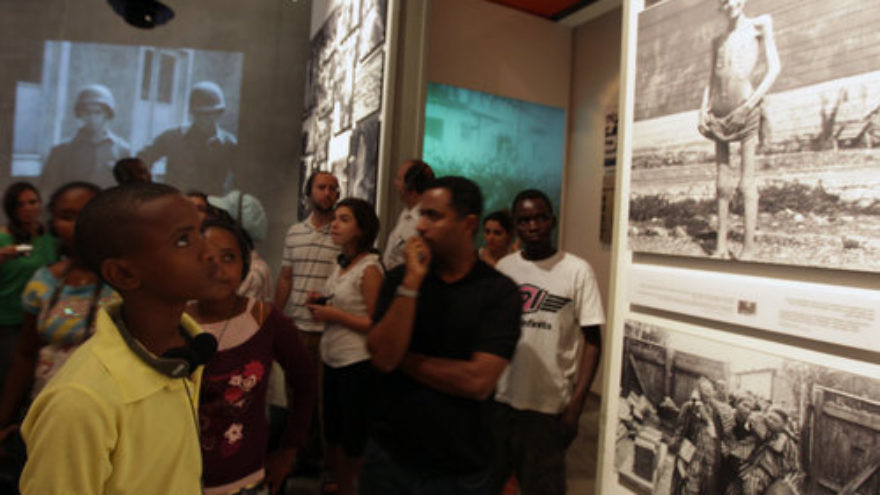 Sudanese refugees, who arrived in Israel in the wake of Darfur genocide, visit Yad Vashem, the Holocaust history museum in Jerusalem in 2009. Credit: Kobi Gideon/FLASH90.