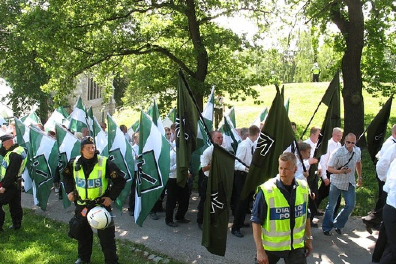 Members of the Swedish Resistance Movement, a neo-Nazi organization, take part in a nationalist demonstration in Stockholm in June 2007. Some experts have questioned the recent Anti-Defamation League survey's finding of a low level of anti-Semitism in Sweden. Credit: Peter Isotalo via Wikimedia Commons.