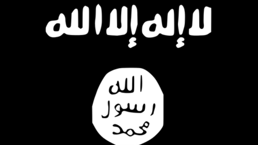 Click photo to download. Caption: The flag of the jihadist terrorist group Islamic State of Iraq and Greater Syria (ISIS), which is driving through the heart of Iraq to the capital of Baghdad and inflicting medieval-style Islamic justice on anyone in its path. Credit: Wikimedia Commons.