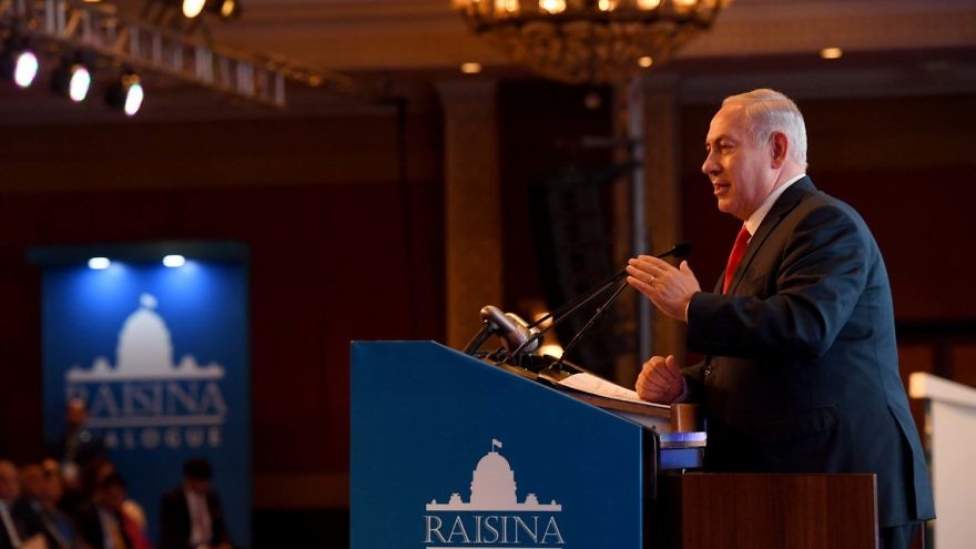 Israeli Prime Minister Benjamin Netanyahu speaks at the Raisina Dialogue in India, January 2018. Credit: Avi Ohayon/GPO.