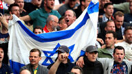 Ajax fans hold an Israeli flag in the stands during the Champions League, Semi Final, First Leg at the Tottenham Hotspur Stadium in London on April 30. Mike Egerton/PA Images via Getty Images