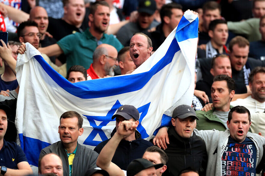 Ajax fans hold an Israeli flag in the stands during the Champions League, Semi Final, First Leg at the Tottenham Hotspur Stadium in London on April 30. Mike Egerton/PA Images via Getty Images
