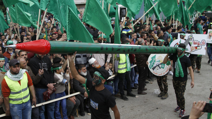 On Dec. 15, 2017, in the Palestinian Authority-controlled city of Nablus, Hamas supporters attend a rally marking the 30th anniversary of the terror group’s founding. Credit: Nasser Ishtayeh/Flash90.