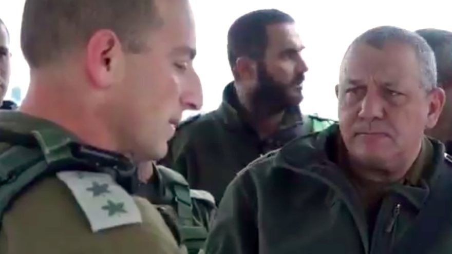 IDF Chief of Staff Lt. Gen. Gadi Eisenkot (right) receives a briefing at the scene of a drive-by shooting terror attack in Samaria. Credit: IDF via Twitter.