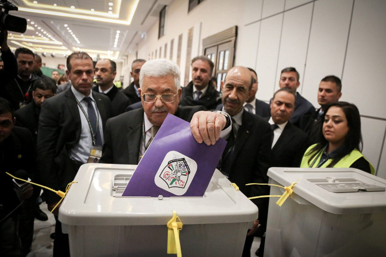 Palestinian Authority leader Mahmoud Abbas casts a vote for members of the Fatah Party's ruling bodies at the P.A. headquarters in the West Bank city of Ramallah on Dec. 3, 2016. Photo by Flash90.
