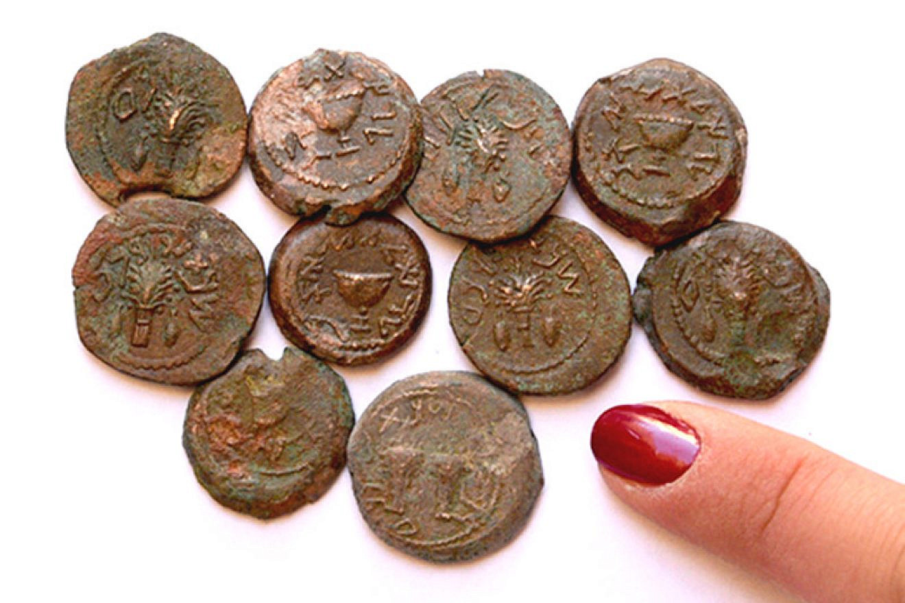 Some of the bronze coins found near the Temple Mount in Jerusalem. Eilat Mazar, Hebrew University of Jerusalem.