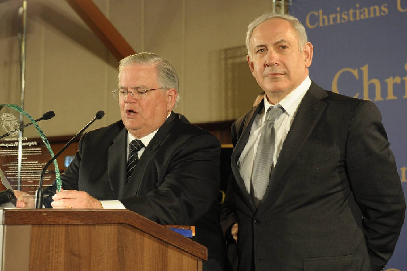 Pastor John Hagee (left) speaks next to Israeli Prime Minister Benjamin Netanyahu during a mission of approximately 800 members of Christians United for Israel in Jerusalem, March 18, 2012. Photo by Amos Ben Gershom/Flash90
