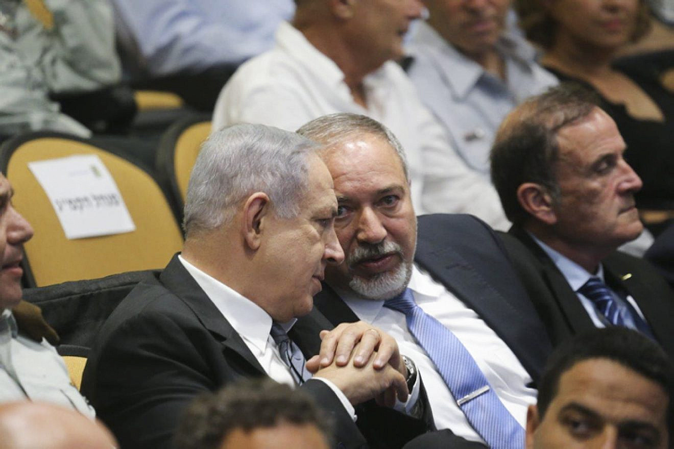 Israeli Prime Minister Benjamin Netanyahu and then-Defense Minister Avigdor Lieberman at a graduation ceremony of the National Security College on July 13, 2016. Photo by Flash90.