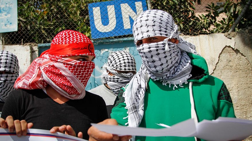 Masked Palestinians demonstrate in the Balata refugee camp in protest against the policy of Scott Anderson, director of UNRWA in the West Bank, on Sept. 17, 2017. Photo by Nasser Ishtayeh/Flash90.