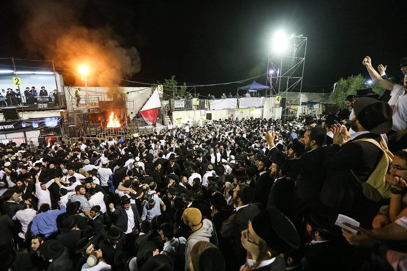 Haredi men take part in the celebration of the Jewish holiday of Lag B’Omer on Mount Meron in northern Israel. May 7, 2015. Credit: Meir Vaknin/Flash90