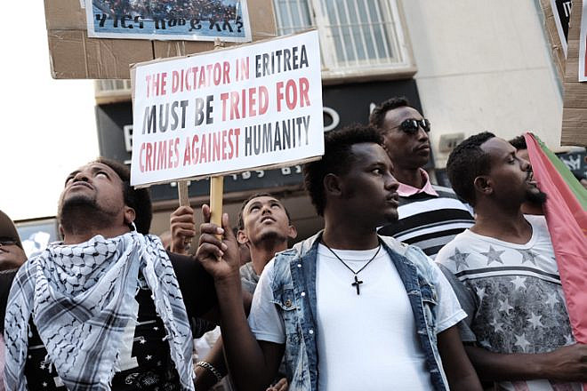 Eritrean migrants protest in front of the E.U. embassy in Ramat Gan, Israel, calling for the European Union to try the Eritrean leadership for crimes against humanity, on June 21, 2016. Credit: Tomer Neuberg/Flash90.