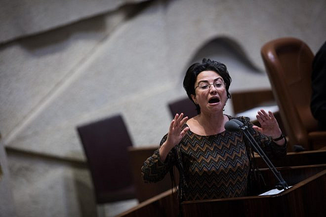 Knesset member Hanin Zoabi speaks during a vote on the so-called “Regulation Bill,” a controversial bill that seeks to legitimize illegal West Bank outposts, in the Israeli parliament, on Dec. 7, 2016. Photo by Hadas Parush/Flash90.