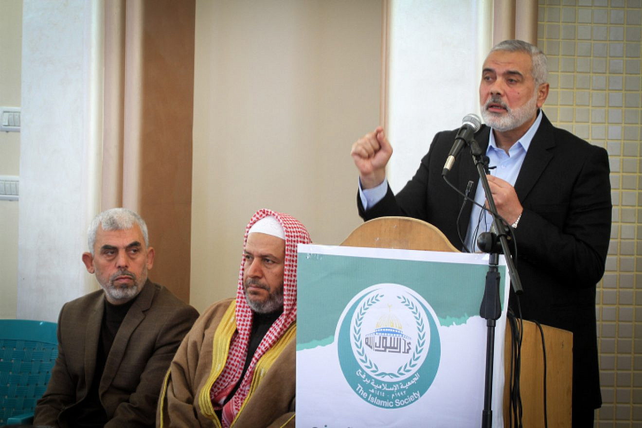 Yahya Sinwar (left), the leader of Hamas in the Gaza Strip, with senior political leaders Khalil al-Haya (center) and Ismail Haniyeh in southern Gaza on Feb. 24, 2017. Photo by Abed Rahim Khatib/Flash90.