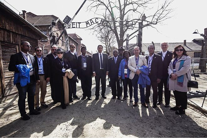 A delegation of U.N. ambassadors with Israeli Ambassador to the United Nations Danny Danon at the Auschwitz-Buchenau concentration camp in Poland join the 30th annual “March of the Living” program on April 12, 2018. Photo courtesy of American Zionist Movement.