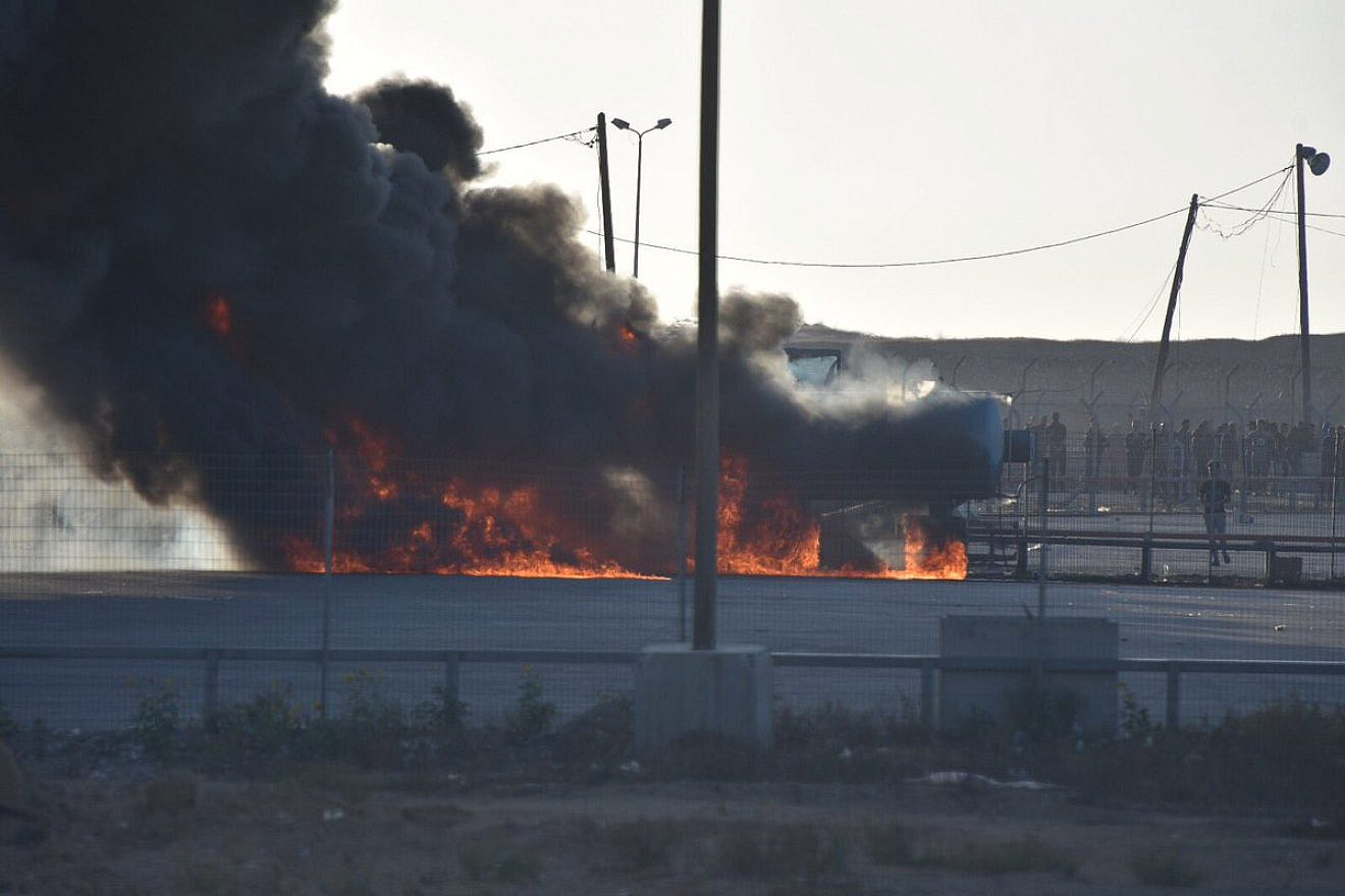Palestinians set fire to the Kerem Shalom Crossing on May 14, 2018. Credit: IDF Spokespersons Unit.