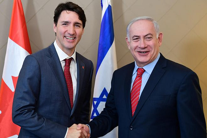 Israeli Prime Minister Benjamin Netanyahu with Canadian Prime Minister Justin Trudeau in Davos, Switzerland, on Jan. 24, 2018. Photo by Amos Ben Gershom/GPO.