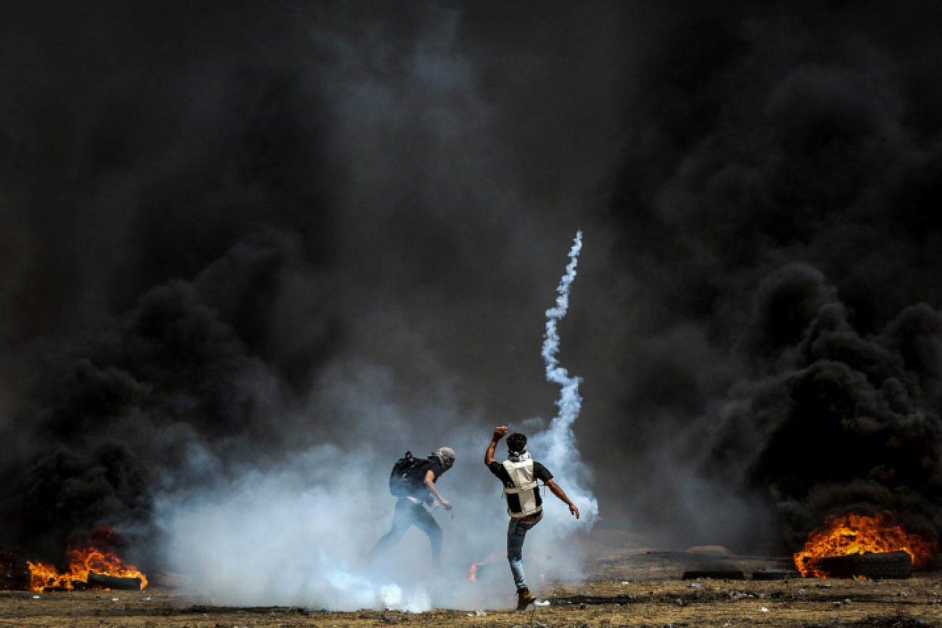 Palestinian rioters during clashes with Israeli forces along the border with Gaza on May 11, 2018. Photo by Abed Rahim Khatib/Flash90.