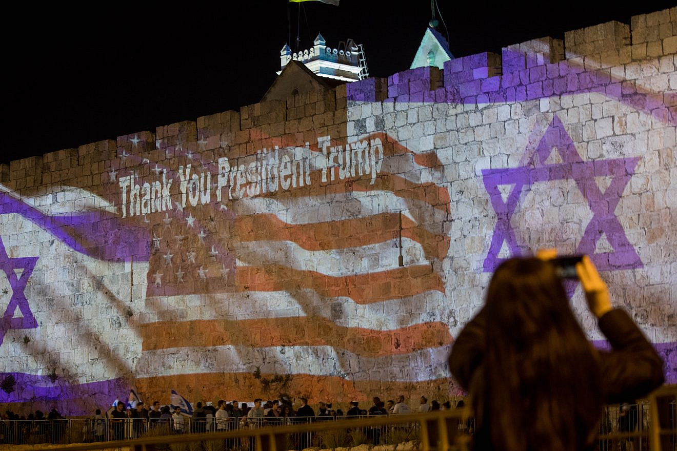 Israeli and the American flags are screened on the walls of Jerusalem’s Old City on May 13, 2018, ahead of the opening of the U.S. embassy in Jerusalem. Credit: Yontan Sindel/Flash90.