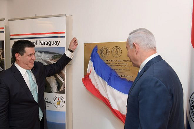 Israeli Prime Minister Benjamin Netanyahu and then-President of Paraguay Horacio Cartes at the opening ceremony for the South American nation's embassy in Jerusalem, May 21, 2018. Photo by Amos Ben Gershom/GPO.