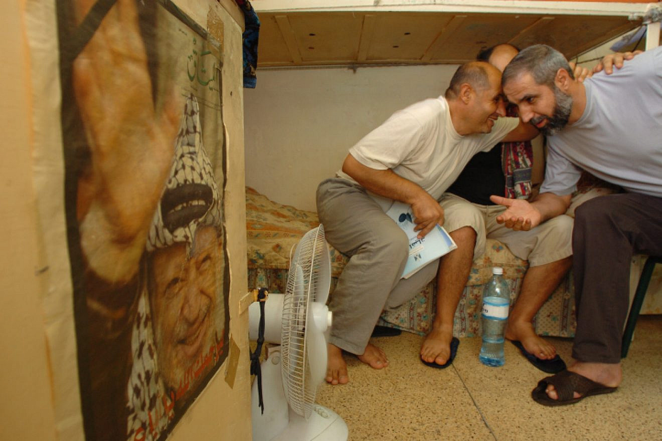 Arab convicts sit and talk in their cell in a jail in the Ayalon complex. Photo by Nati Shohat/Flash90.