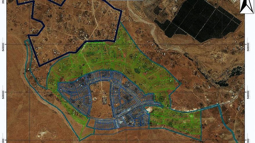 An aerial view of Bir Hadaj, with the private, Jewish-owned land marked by blue lines. (Credit: Regavim)