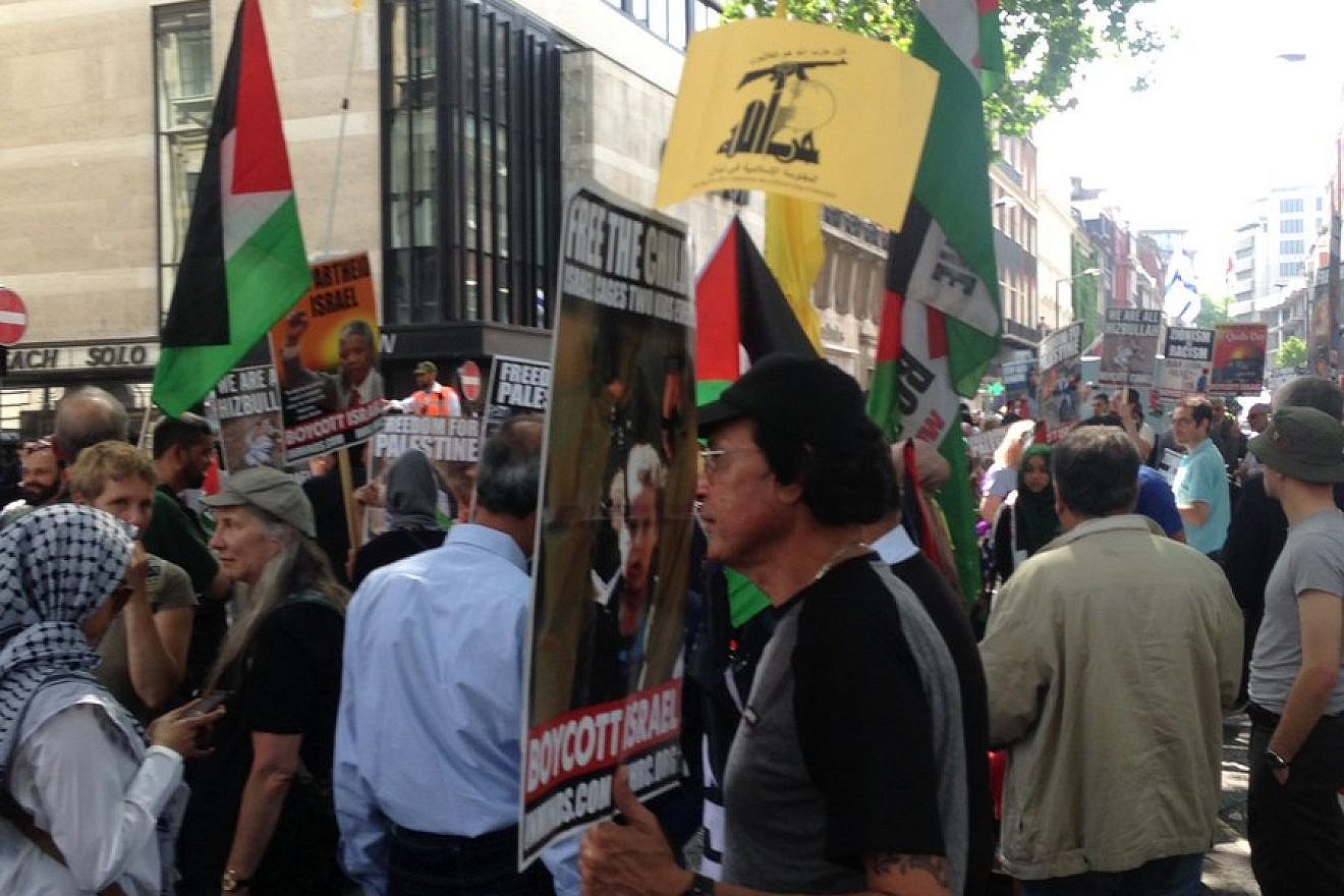 A Hezbollah flag during “Al-Quds Day” demonstrations on the streets of London. Credit: Zionist Federation via Twitter.
