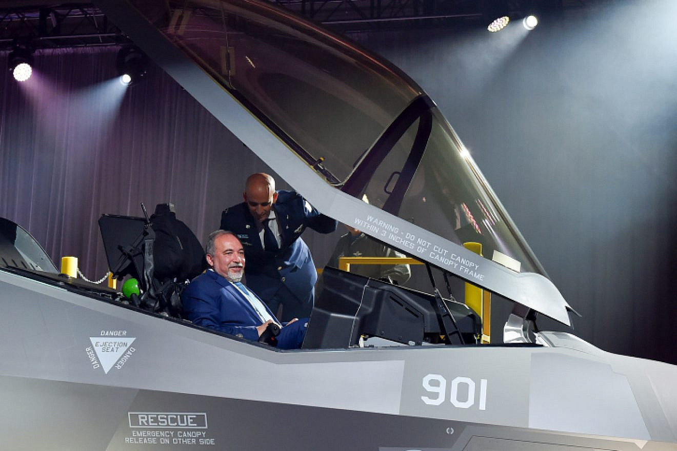 Israeli Defense Minister Avigdor Lieberman sits inside the new F-35 stealth aircraft during a ceremony at the manufacturing factory the Lockheed Martin aerospace company in Fort Worth near Dallas on June 23, 2016. Photo by Ariel Hermoni/Ministry of Defense.