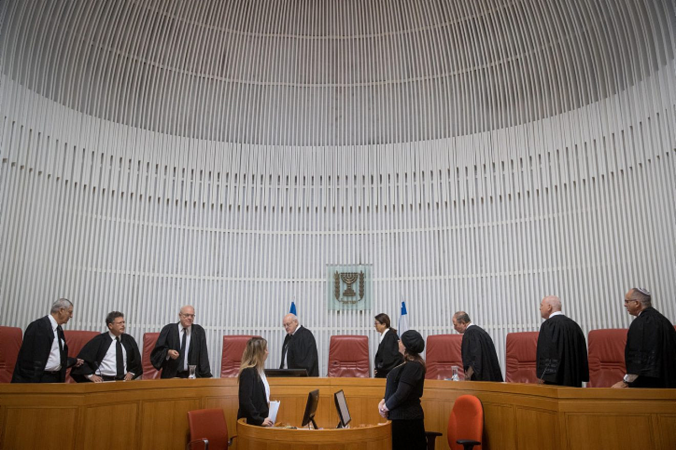 Israeli Supreme Court justices and Supreme Court president Esther Hayut arrive in the courtroom in Jerusalem. Photo by Yonatan Sindel/Flash90.
