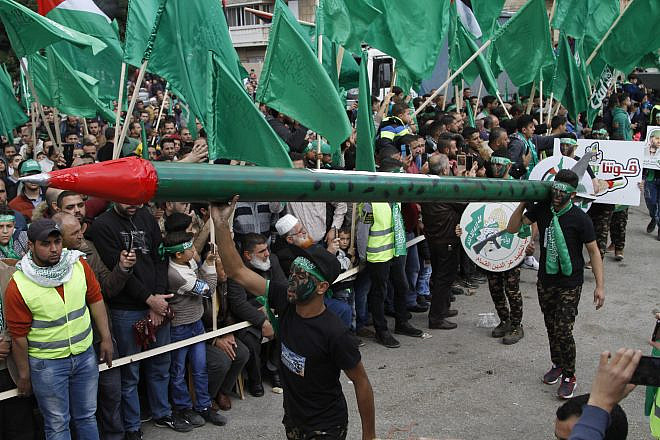 Palestinians participate in a rally in Nablus marking the 30th anniversary of the founding of Hamas. Credit: Nasser Ishtayeh/Flash90.