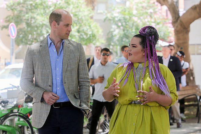 Prince William, Duke of Cambridge, walks with winner of the Eurovision 2018 song contest Netta Barzilai on Rothschild Boulevard in Tel Aviv on June 27, 2018. Photo by Marc Israel Sellem/POOL.